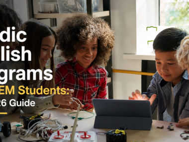Diverse group of children collaborating on a robotics project using a tablet, illustrating the hands-on nature of Nordic English Programs.